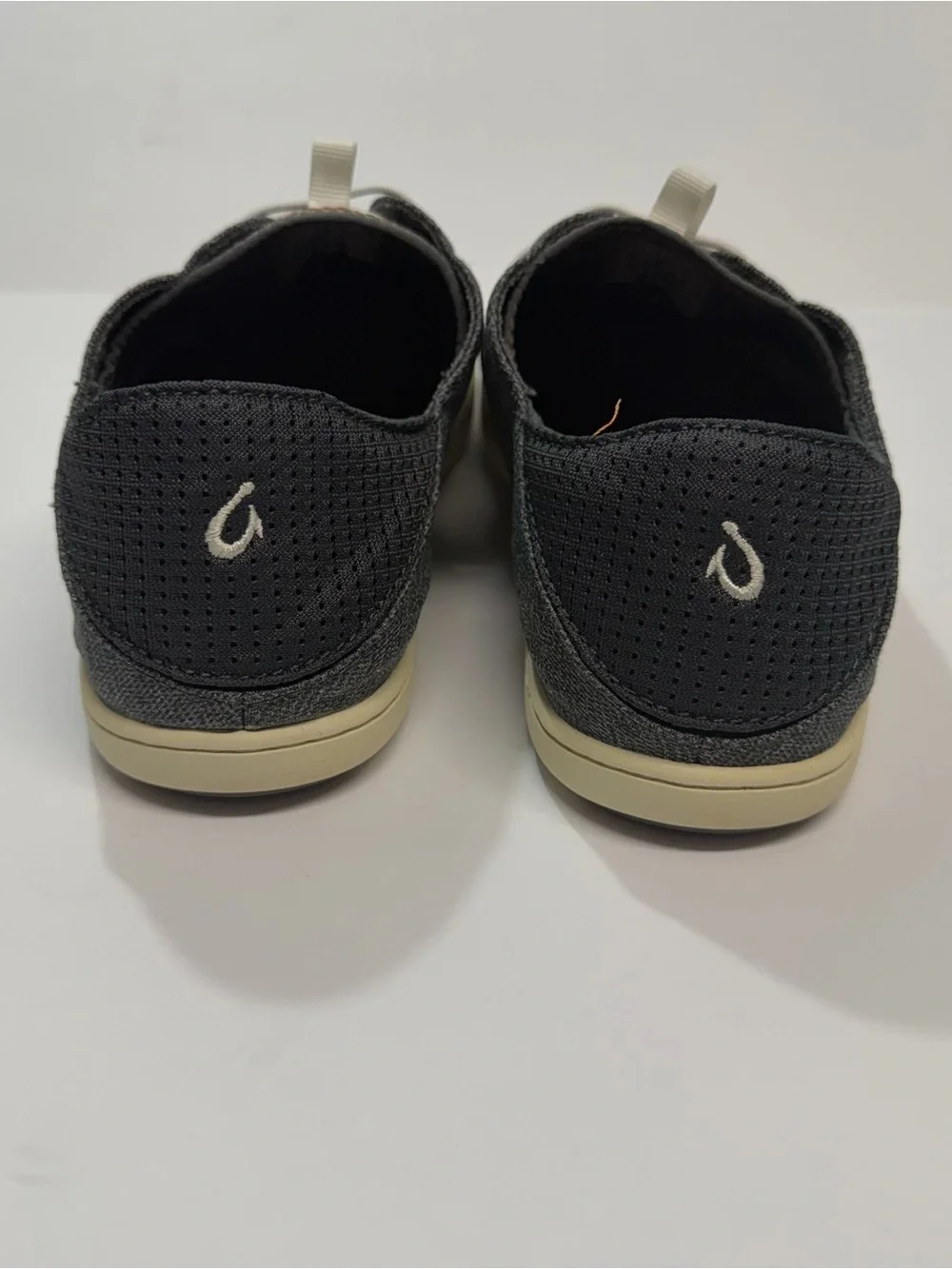 OluKai Men's Black and Cream Casual Perforated Slip-On Sneakers